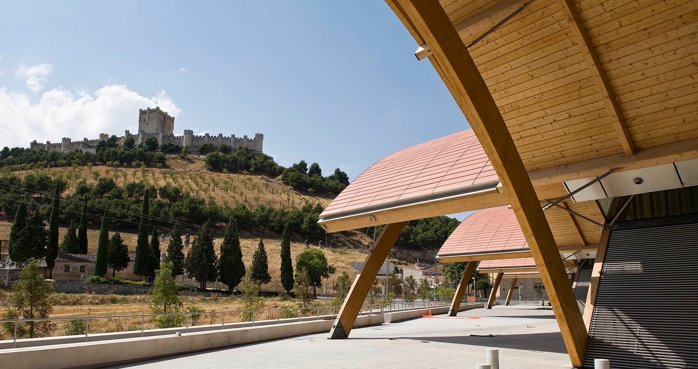 The winery building by Richard Rogers beneath the castle of Peñafiel
